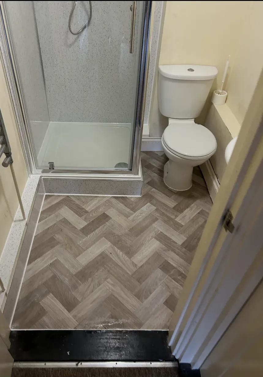 Tiled shower and enclosure fitted by PHG